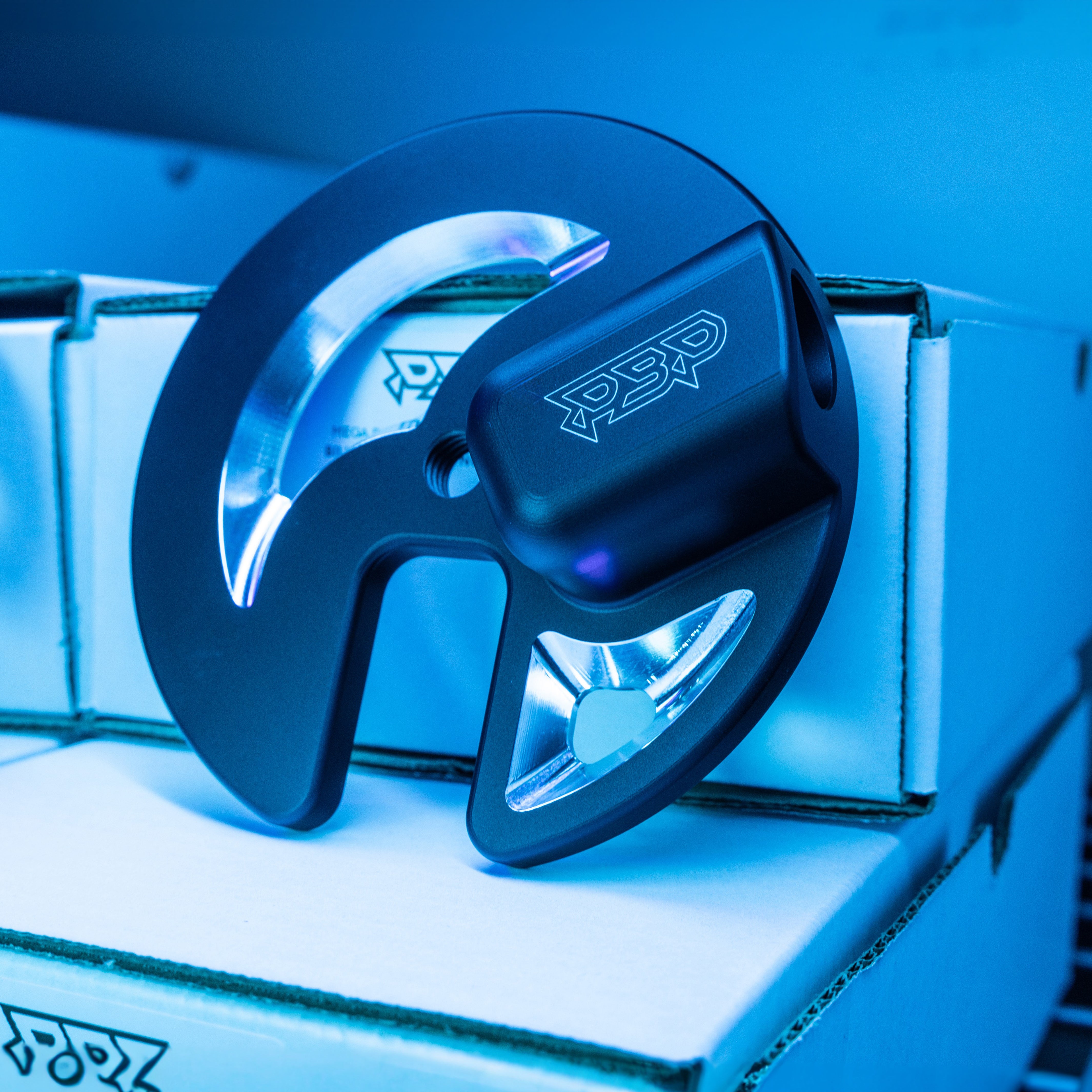 Mega pacman fuel sump street top plate anodized black.