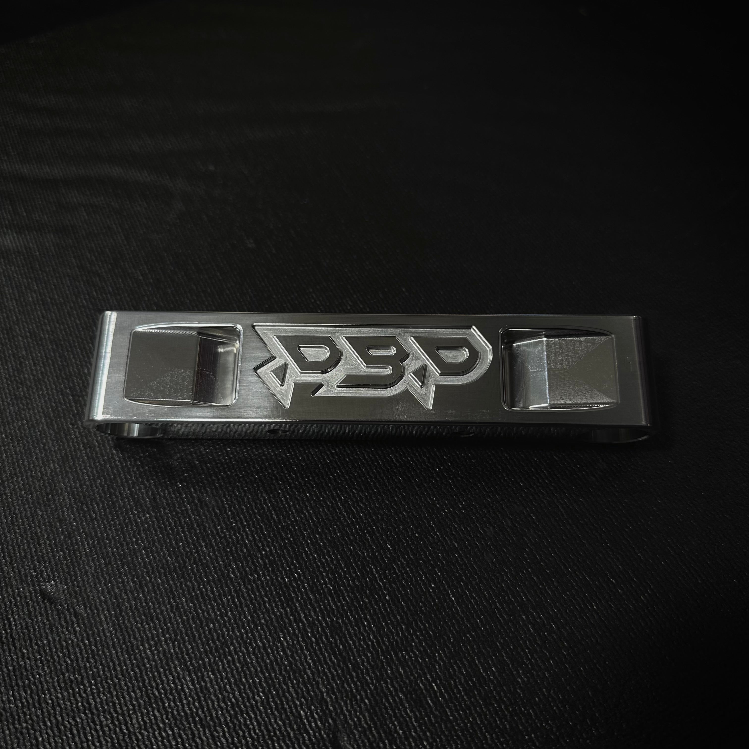 5g cummins remote dipstick bracket raw billet with pockets. Front side. 