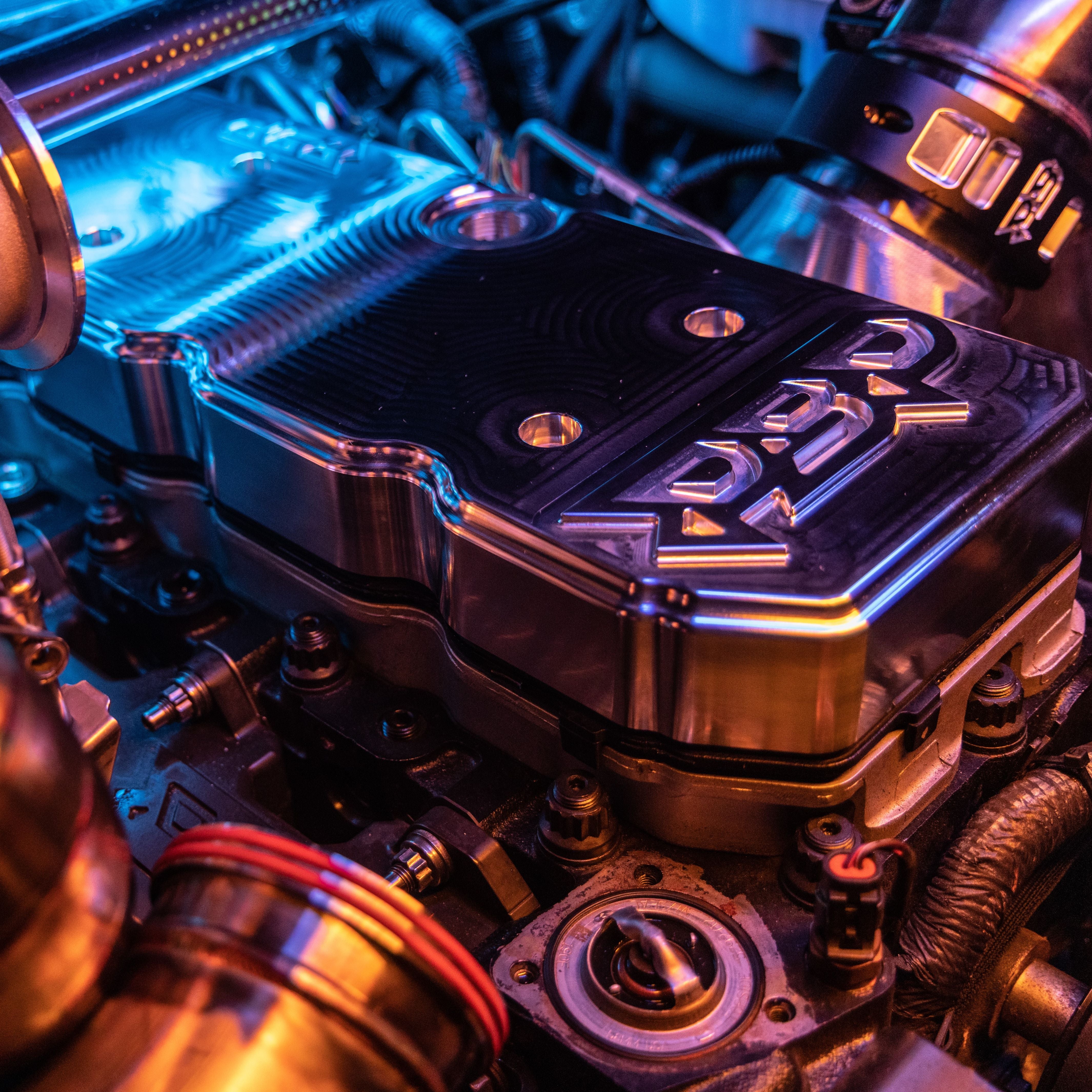 6.7L Cummins Billet Valve Cover. Side profile. 