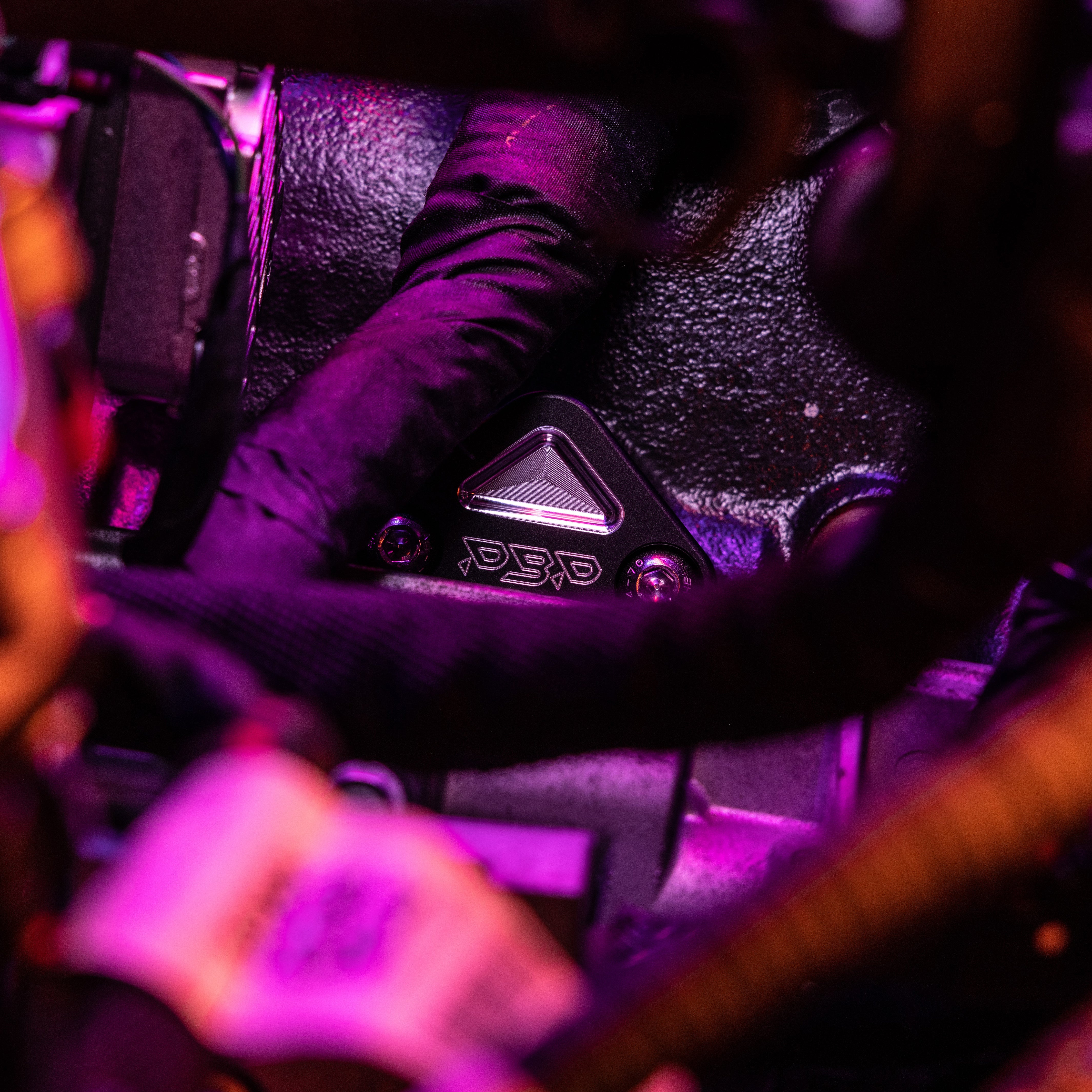 Cummins crankcase blockoff plate installed anodized black.